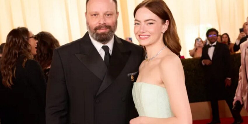 Director Yorgos Lanthimos and actor Emma Stone together in black-tie outfits