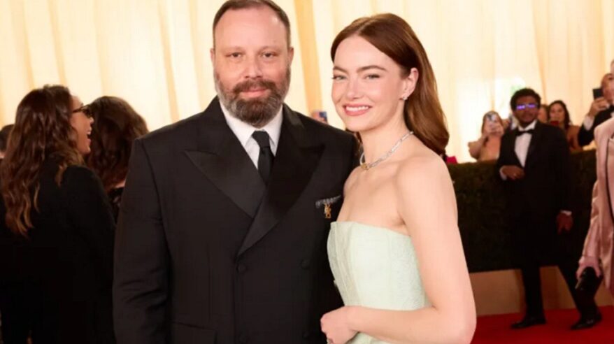 Director Yorgos Lanthimos and actor Emma Stone together in black-tie outfits