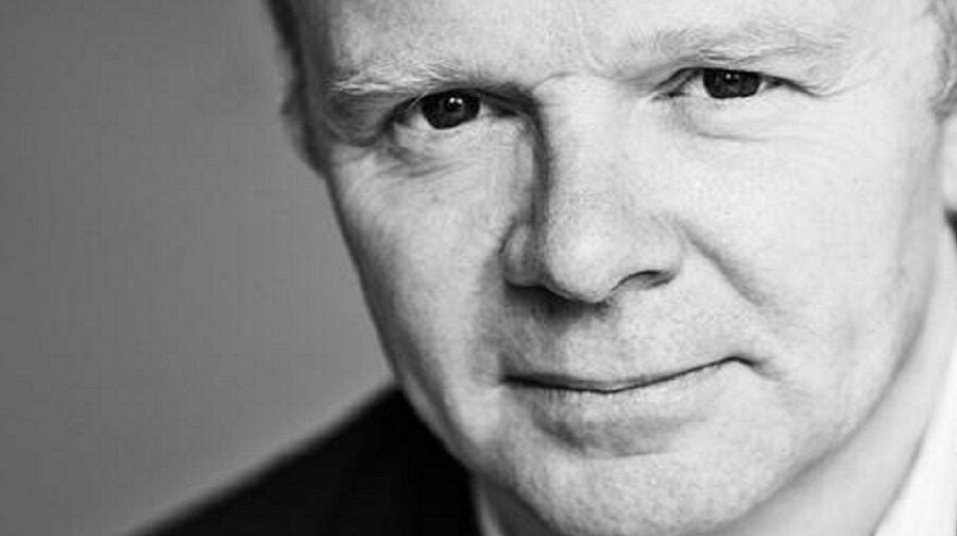 Black and white close-up of actor Jason Watkins