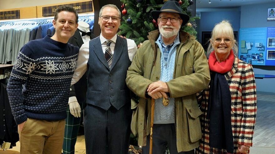 Presenter Matt Baker stands with tartan maker John Kinloch Anderson and Matt's parents in a row