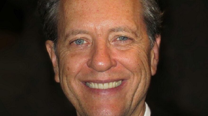 Close-up headshot of actor Richard E Grant