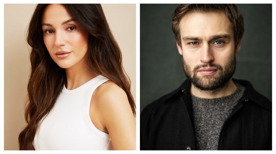 Actors Michelle Keegan in white vest top and Douglas Booth in grey sweater with black jacket