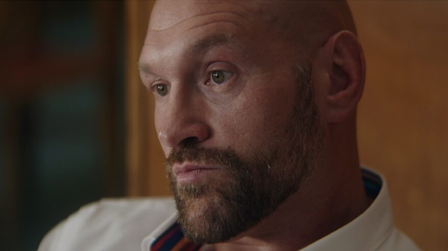 Close-up of bearded boxer Tyson Fury, taken from the side with him looking ahead in feature doc Fury