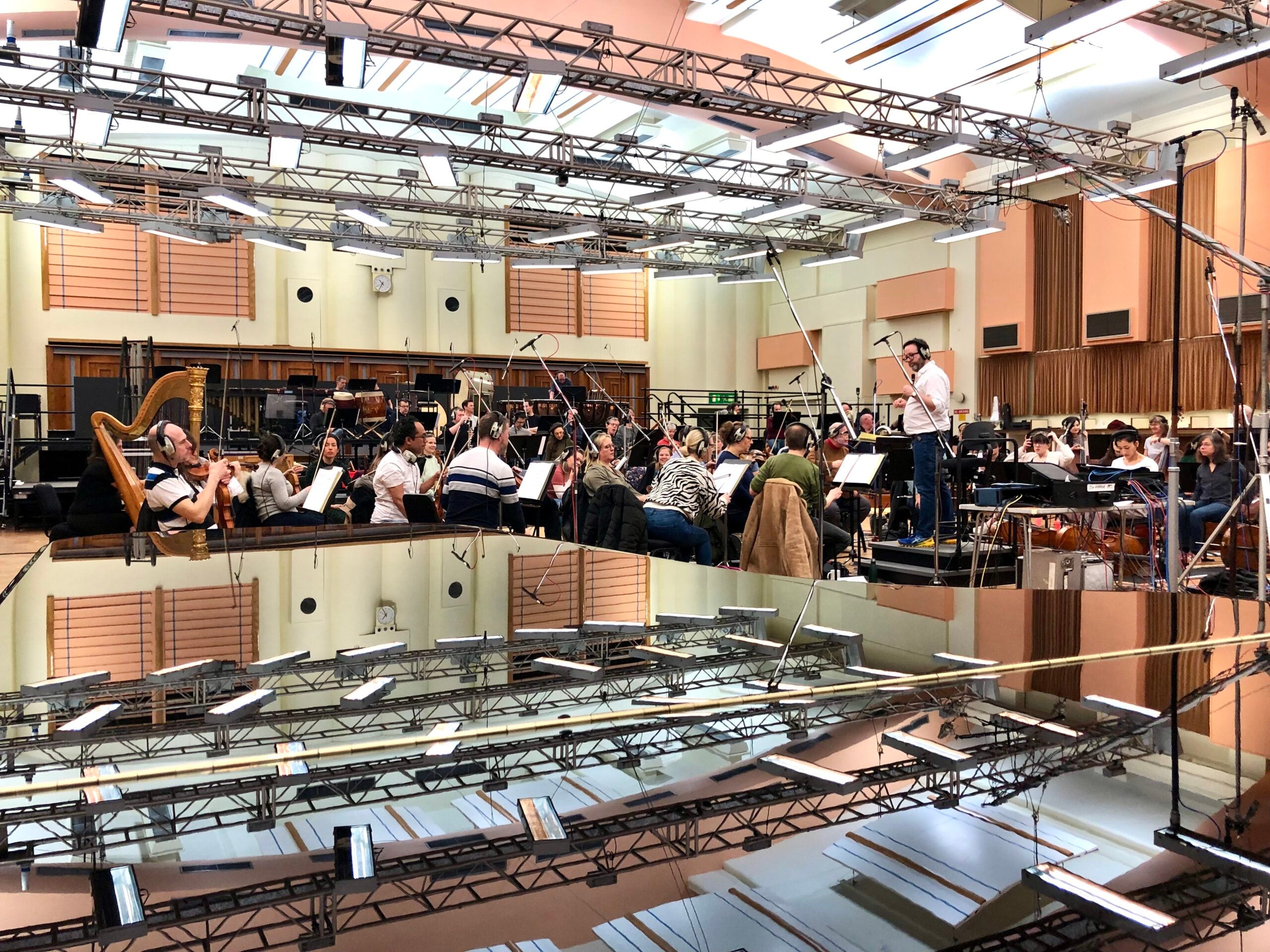 Tom Kelly conducting an orchestra at Maida Vale Studios for TV and Film music