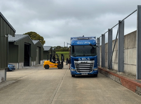 Truck at storage area in Henden Manor